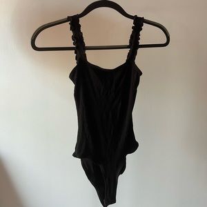 Black ribbed body suit